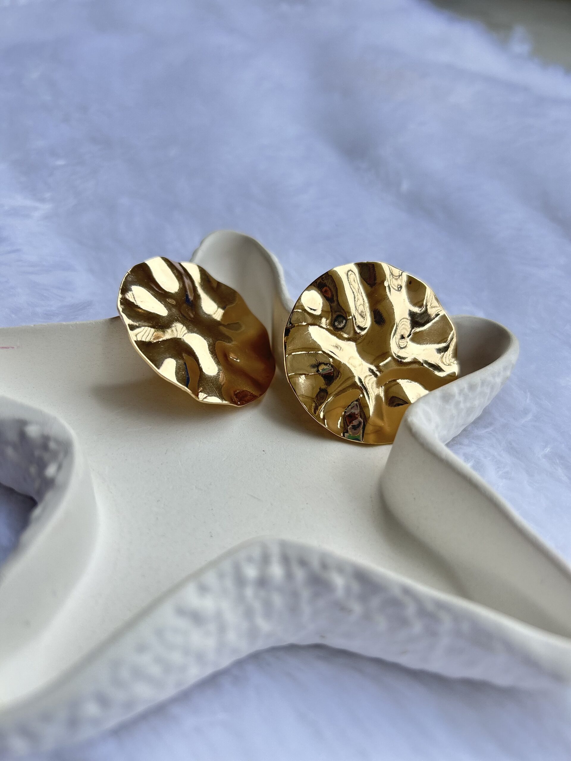 Gold bossy earrings